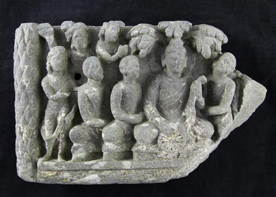 An Indian grey schist stele fragment, possibly Gandhara 2nd/3rd century AD, 8.75in. x 14.25in.